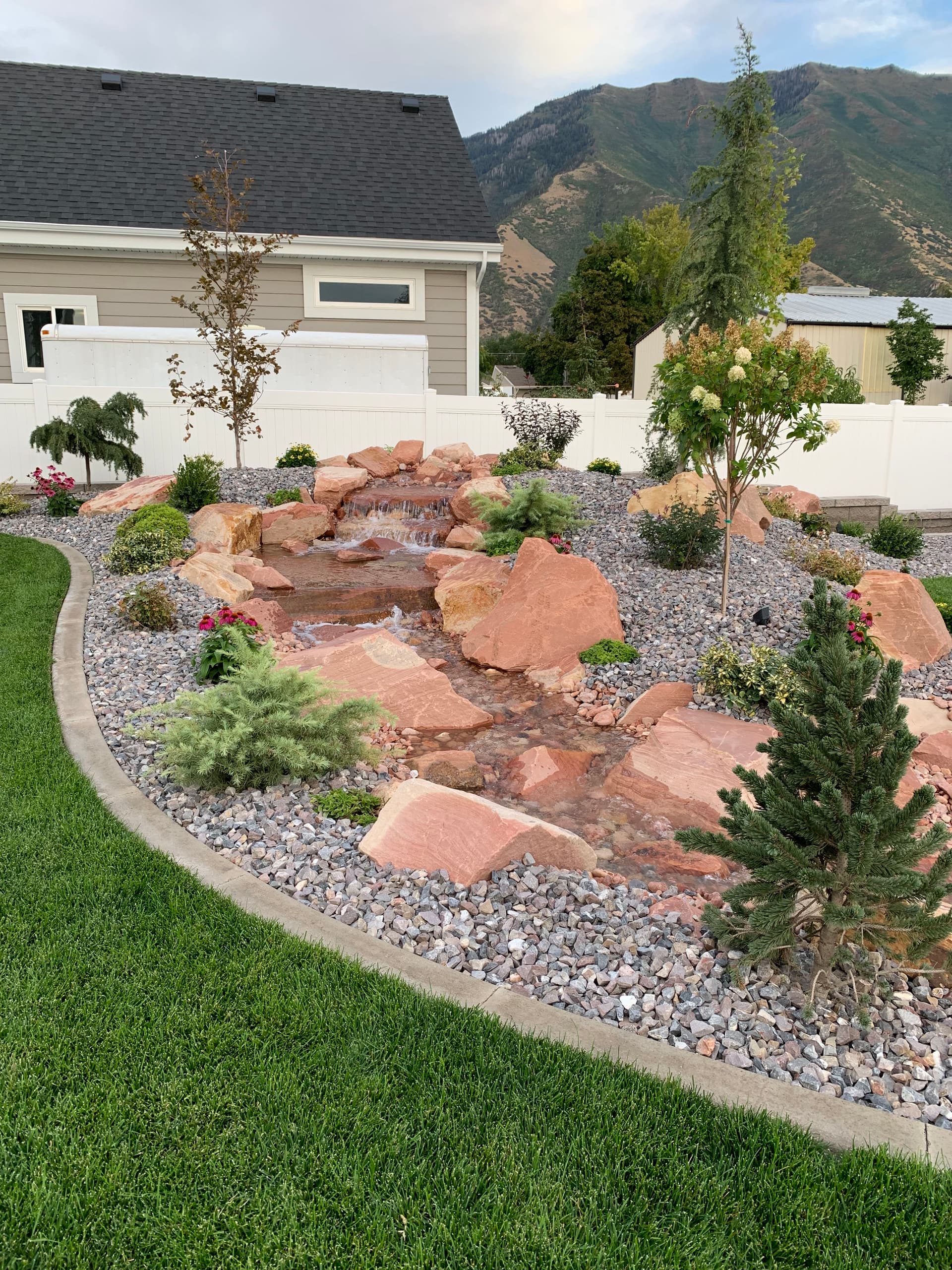 Custom Landscape Design with Rock Water Features in Mapleton